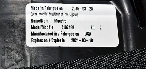 Car seat manufacturer label listing the manufacture date and an expires on date